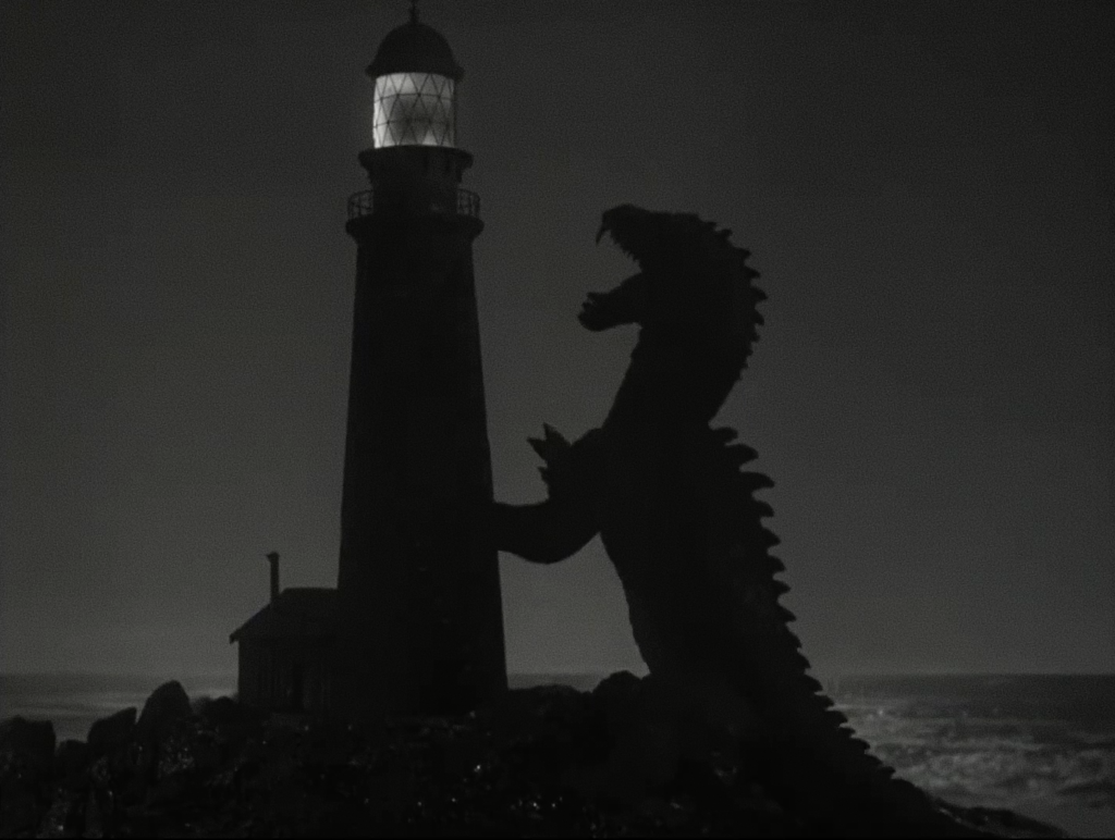 A giant monster silhouette appears menacingly beside a lighthouse in a dramatic black-and-white scene, evoking a sense of mystery and tension.