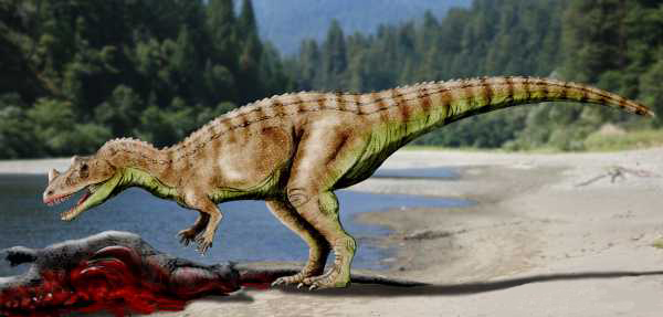 A large dinosaur with a brown and green scaly body stands on a sandy riverbank, leaning towards a bloody carcass. Lush forest in the background.