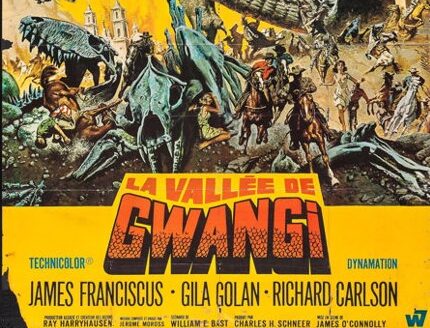 Vintage movie poster for "La Vallée de Gwangi." A giant dinosaur towers over cowboys on horseback amid chaos, with vibrant orange and yellow tones.