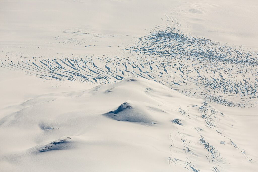 snow covered mountain during daytime