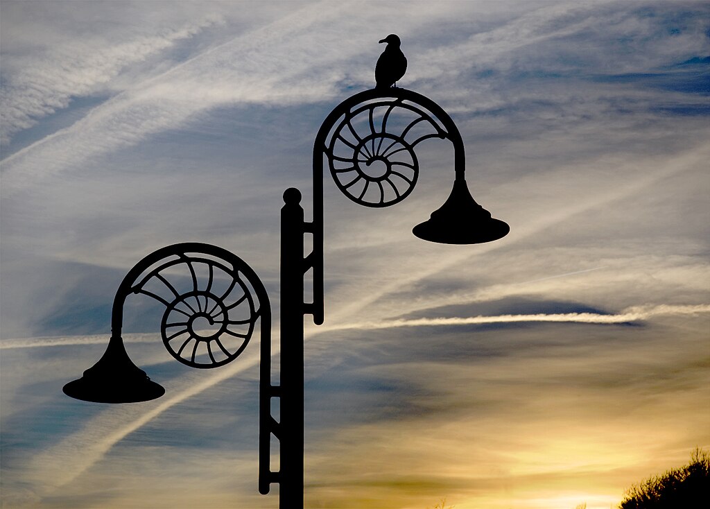 Ammonite lamp post at dusk, Lyme Regis