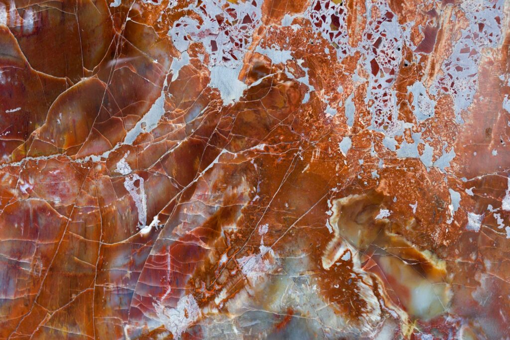 a close up of a red and white marble