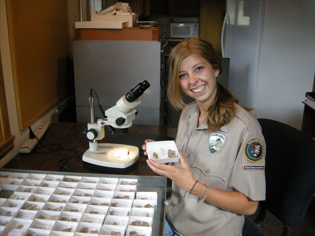Working on organizing the fossil collection at Florissant Fossil Beds National Monument, Colorado, is Alison Dernbach (GIP). (NPS Photo by Alison Dernbach, GIP)