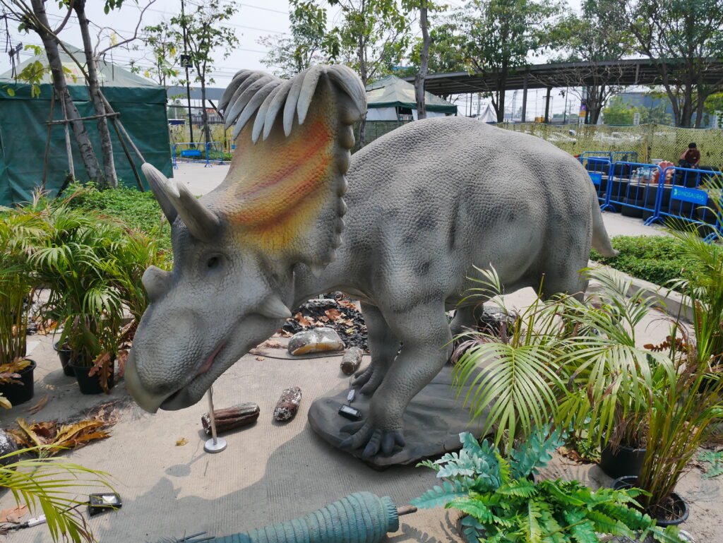 Illustration of a Kosmoceratops in a Park
