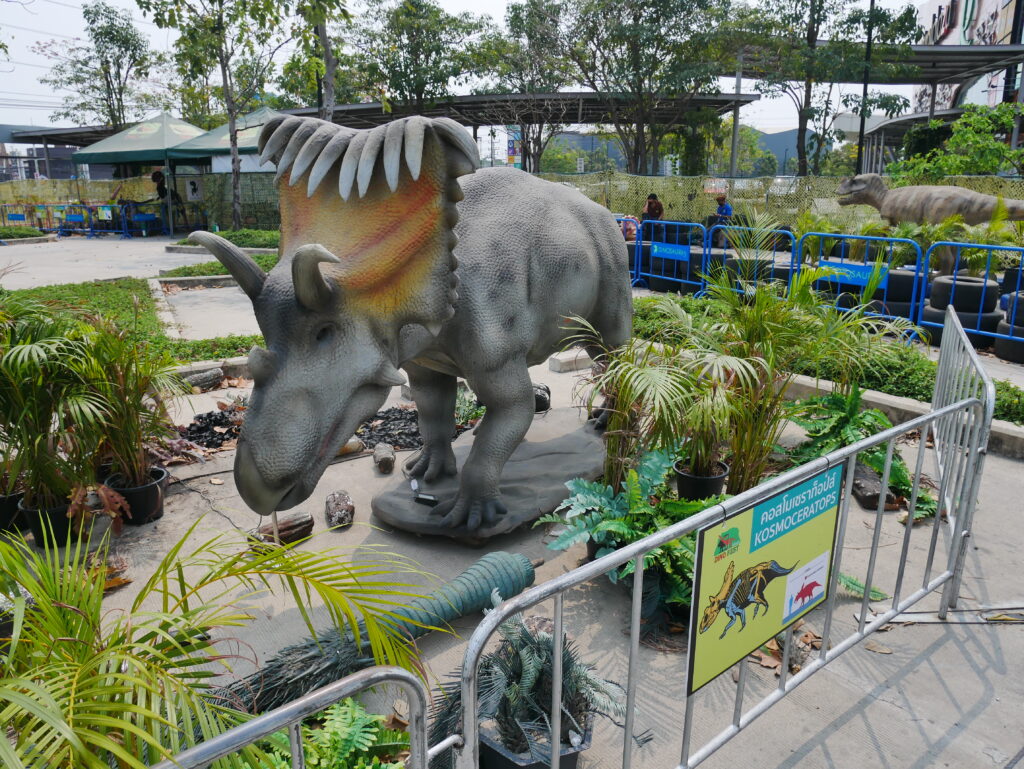 Illustration of a Kosmoceratops in a Park