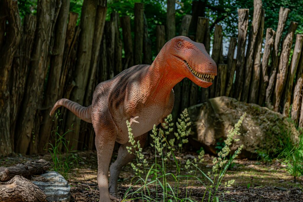 a dinosaur in a forest