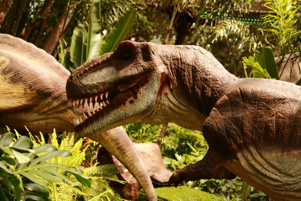 A close up of a dinosaur in a forest