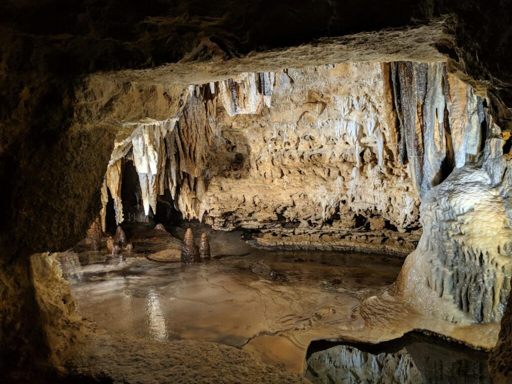 Explore the natural beauty of stalactites inside Blue Mound Cave, Wisconsin.