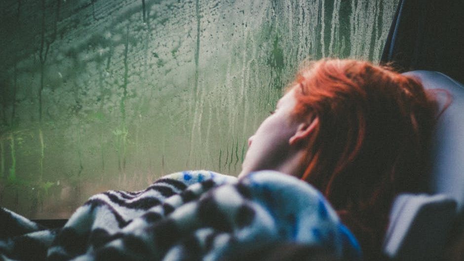 Psychology Says People Who Sleep Better With Rain or Jungle Sounds May Be Comforted by Ancient Evolutionary Memories