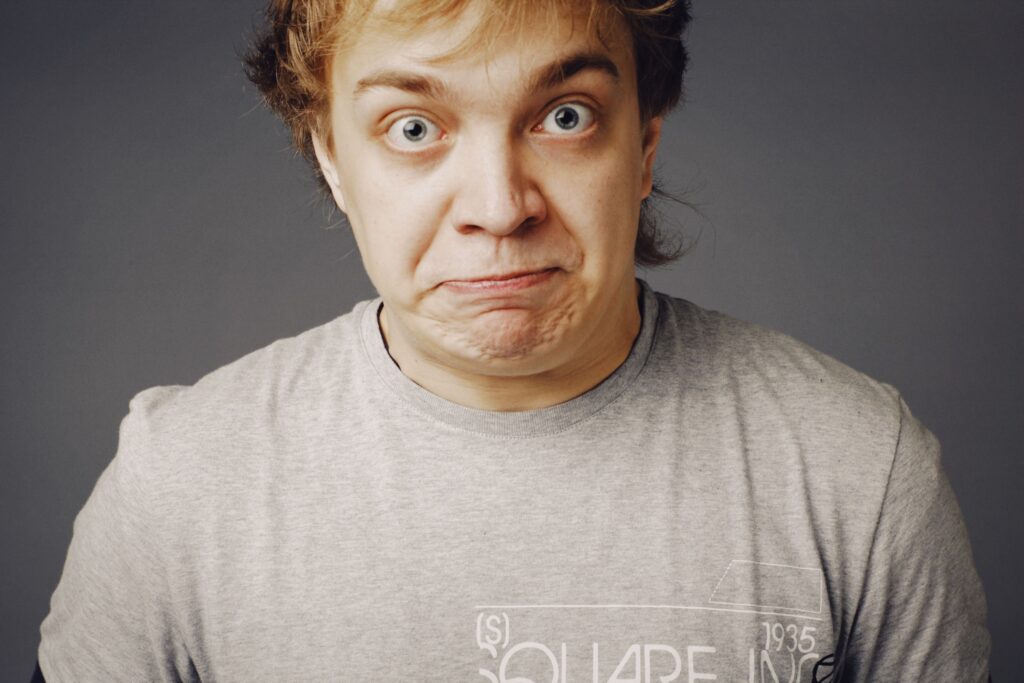 Evolution says the human habit of unconsciously mimicking the facial expressions of people around us is a 30-million-year-old social bonding mechanism we share with great apes