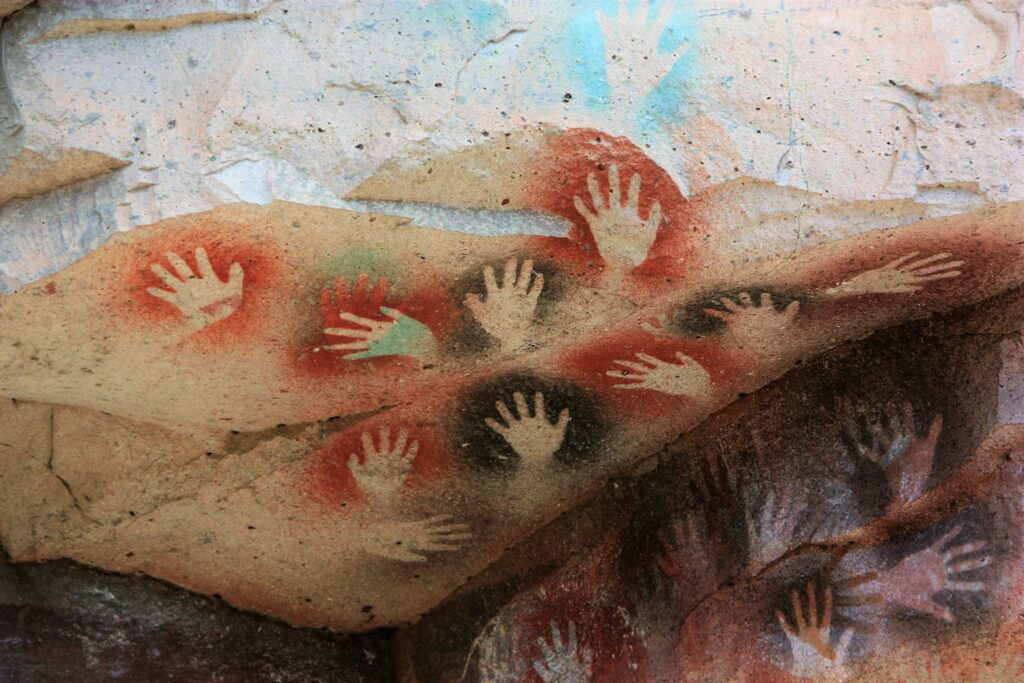 The prehistoric handprints found in a cave in Borneo that are at least 40000 years old - older than any equivalent found in Europe - and what they tell us about the minds that made them